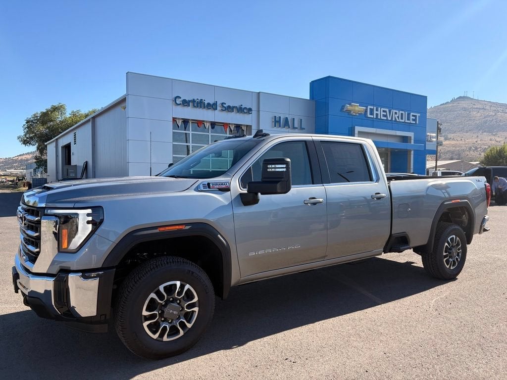 2026 GMC Sierra 3500 HD SLE in Sterling Metallic — front three-quarter view
